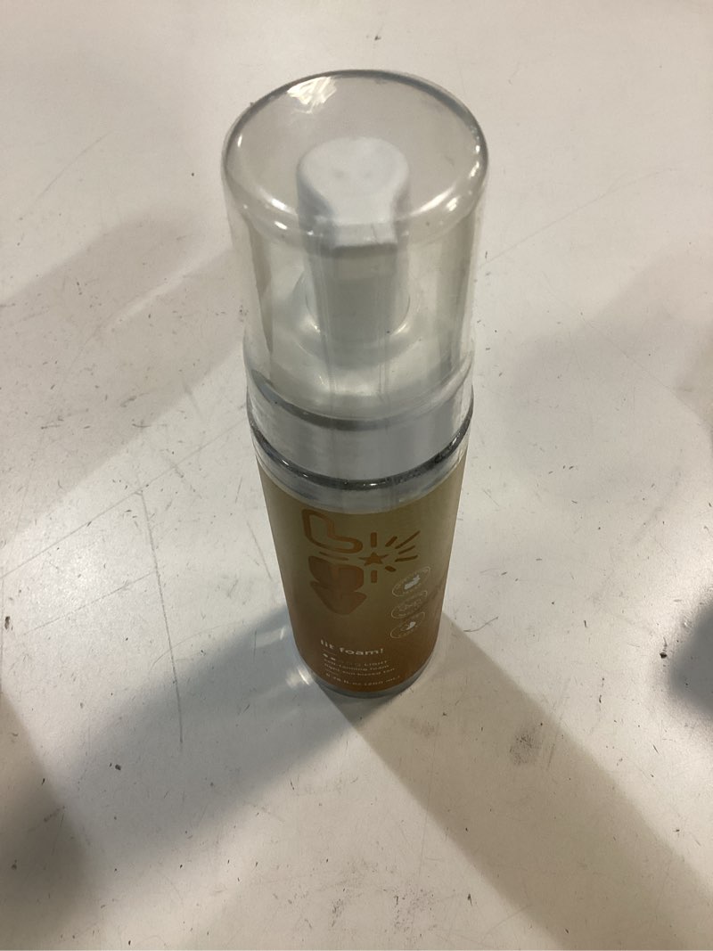 Condition photo showing New/Like New for l-uv lit foam! light sun kissed tan. transparent and no color transfer foam with vitamin c and e. perfect for a natural and flawless looking tan.