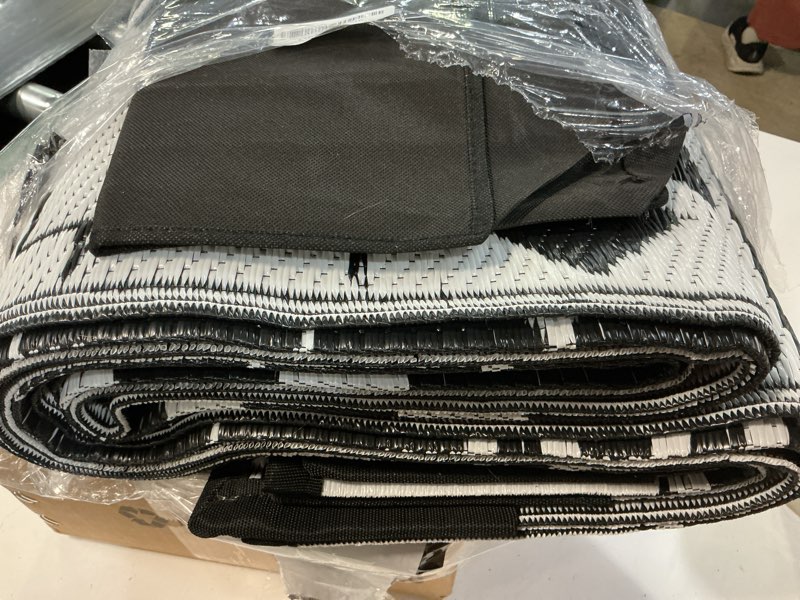 Condition photo showing Good Condition for waterproof outdoor rug 5x8ft, boho reversible plastic straw mat for patio rv deck porch backyard balcony camping picnic beach indoor outdoor carpet, black&white boho (black&white) 5 x 8 feet