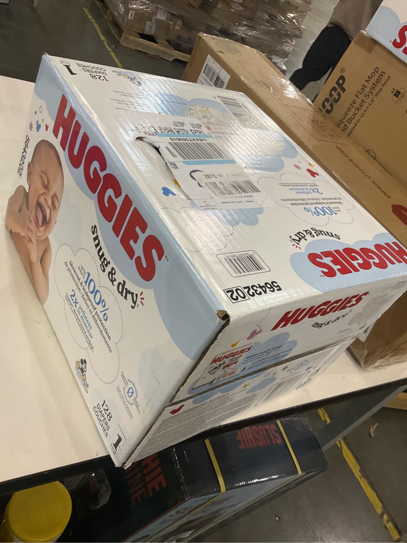 Condition photo showing New/Like New for Huggies Size 1 Diapers, Snug & Dry Newborn Diapers, Size 1 (8-14 lbs), 128 Count, Packaging May Vary Size 1 128