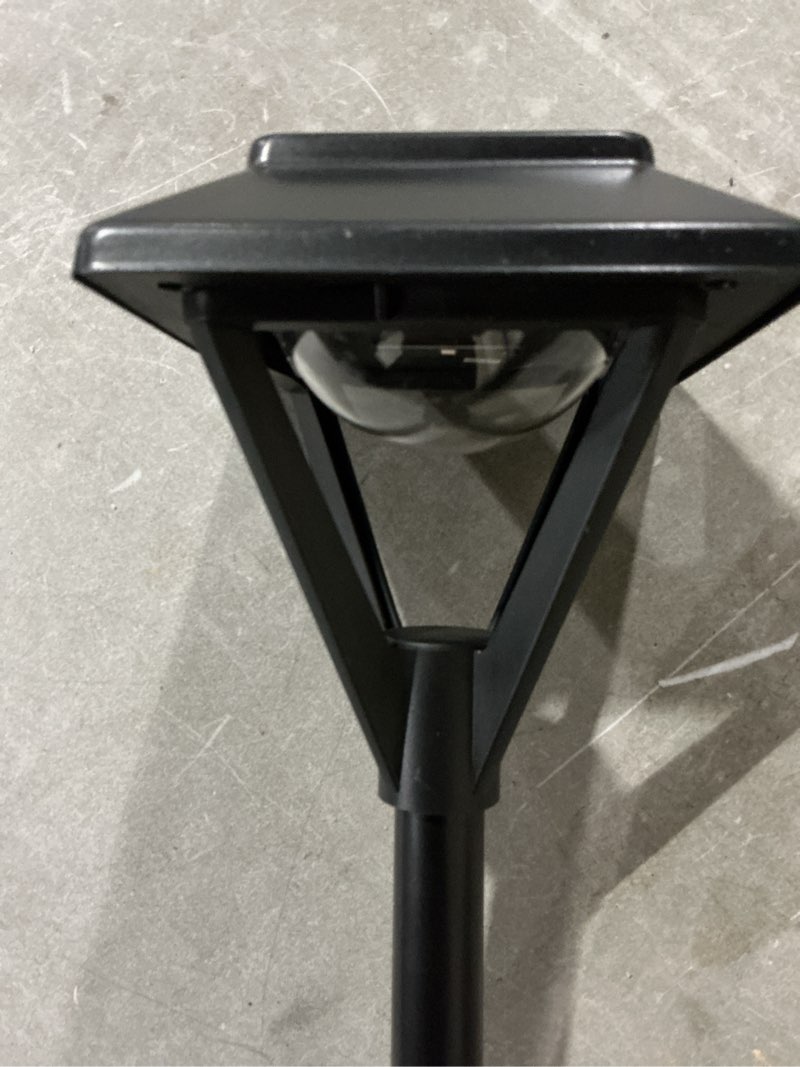 Condition photo showing As Is for (incomplete pieces missing )harbor breeze pyramid path 20 -lumens black solar led outdoor path light with dusk-to-dawn