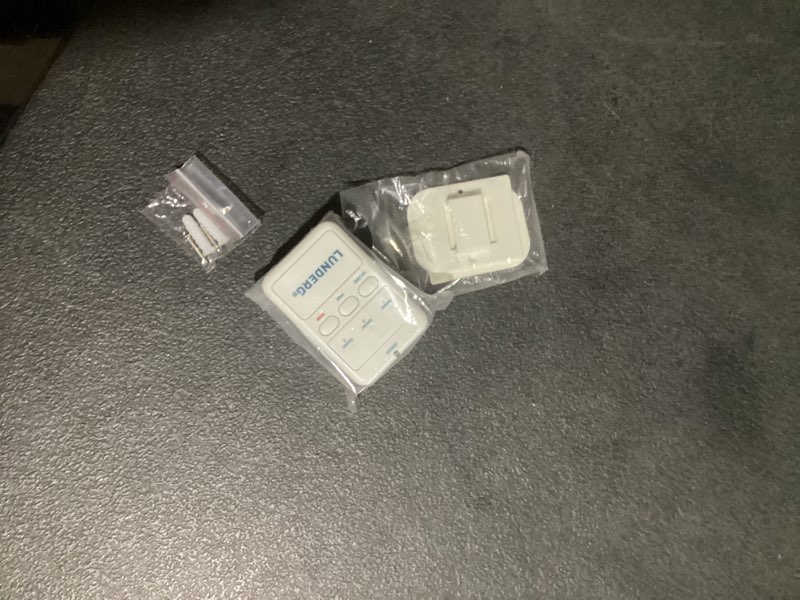 Condition photo showing New/Like New for lunderg monitor pager replacement bed or chair alarm systems - includes only pager, batteries and wall-mount (sensor pad and other accesories not included)