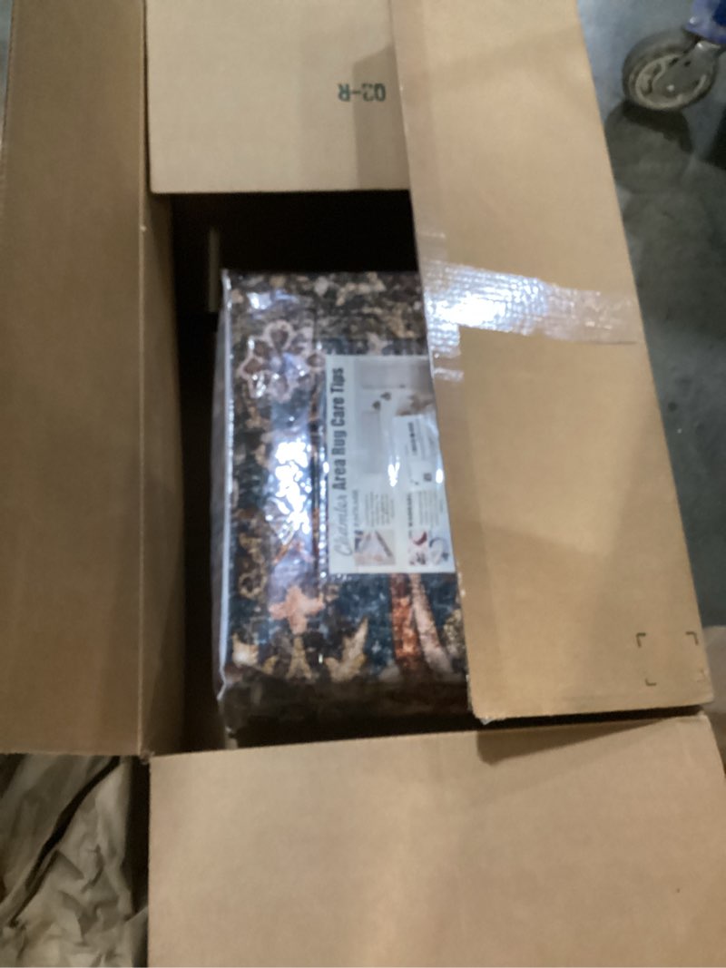 Condition photo showing New/Like New for SAFAVIEH Charleston Collection Area Rug - 9' x 12', Navy & Creme, Oriental Distressed Design, Non-Shedding & Easy Care, Ideal for High Traffic Areas in Living Room, Bedroom (CHL412N) similar