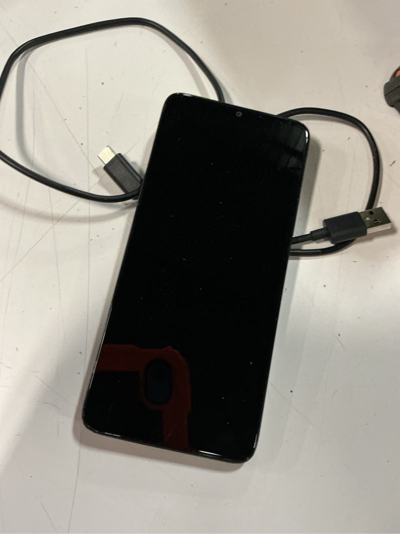 Condition photo showing As Is for straight talk tcl k33, 5g, 64gb, gray - prepaid smartphone [locked to straight talk].   *** working condition verified. no network or connectivity tests were performed. bidder be advised ***