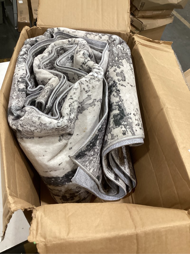 Condition photo showing Good Condition for safavieh alenia collection area rug - 9' x 12', grey & blue, modern abstract marble design, non-shedding & easy care, ideal for the living room, dining, bedroom (aln104f) 9' x 12' (rectangular) grey/blue