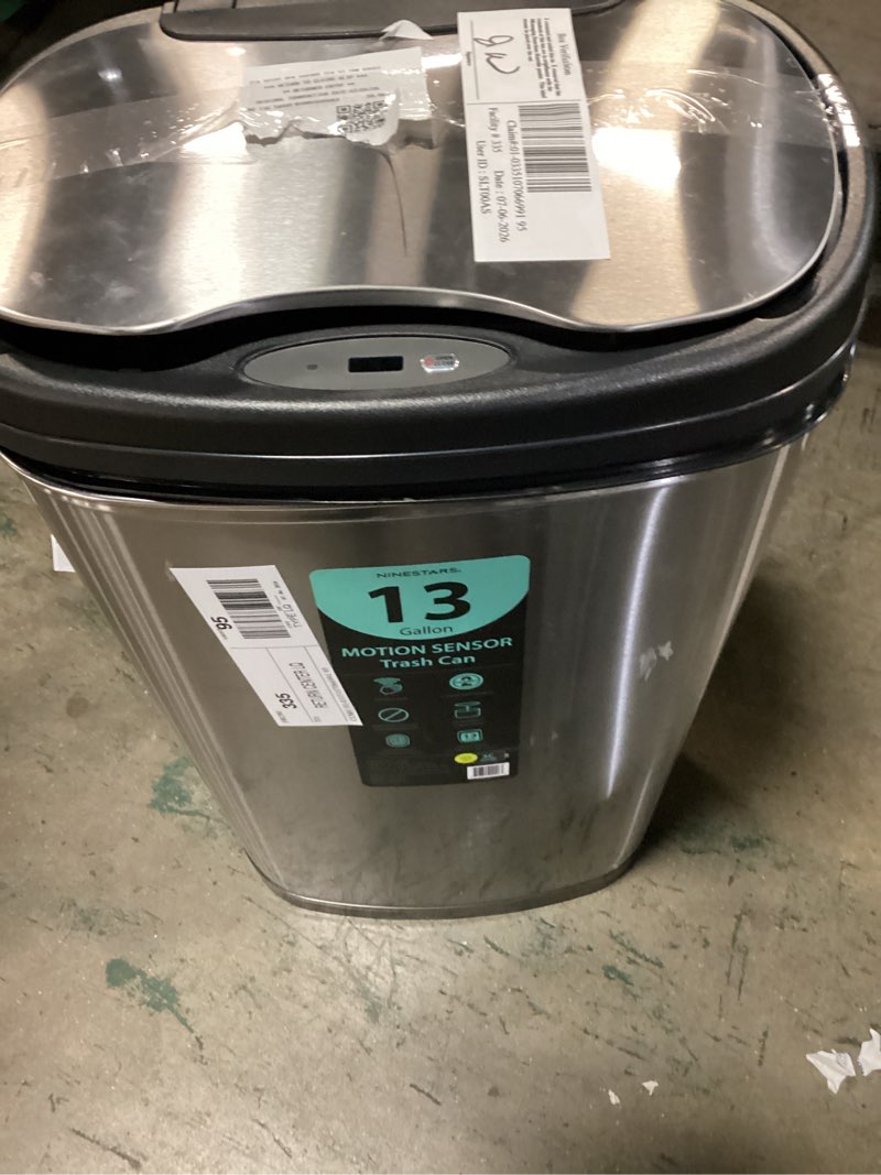 Condition photo showing As Is for nine stars 13.2 gallon trash can, motion sensor kitchen trash can, stainless steel