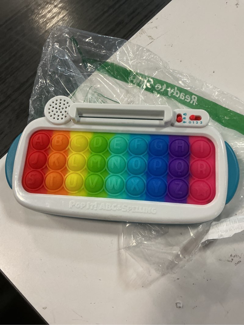 Condition photo showing As Is for chuckle & roar pop it! abc & spelling keyboard – interactive alphabet & sight word learning toy with led lights, soft sensory keys, 3 grow-with-me modes, screen-free educational toy for kids