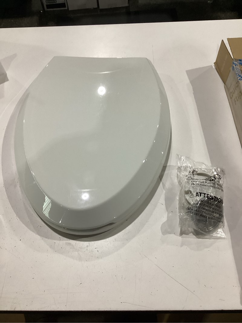 Condition photo showing Good Condition for jool baby quick flip toilet seat with built-in potty & splash guard for toddler training, slow close (elongated) oblong