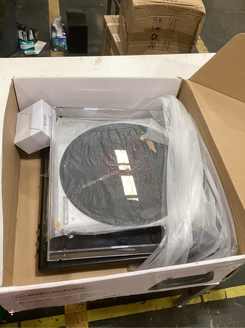 Condition photo showing As Is for audio-technica at-lp60x-bk fully automatic belt-drive stereo turntable, black, hi-fi, 2 speed, dust cover, anti-resonance, die-cast aluminum platter black wired turntable