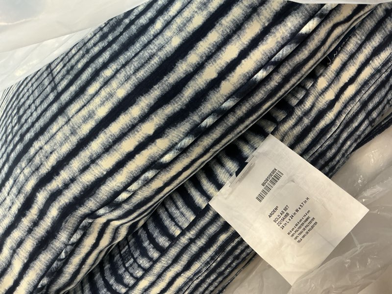 Condition photo showing Good Condition for arden outdoor deep seat cushion set, 24 in x 24 in, weather-proof, rain-proof, fade resistant patio cushion for chair, sofa, and couch blue shibori stripe polyfill blue shibori stripe 1 pack
