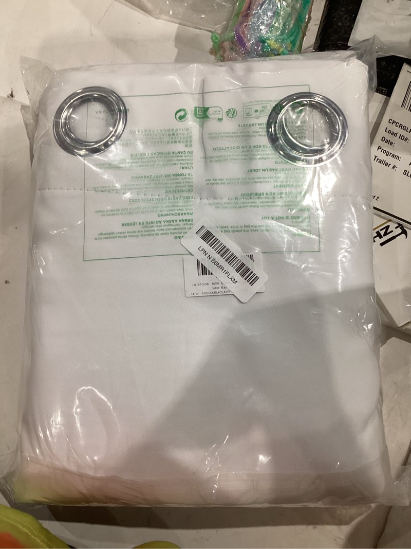 Condition photo showing New/Like New for NICETOWN 100% Blackout Window Curtain Panels, Cold and Full Light Blocking Drapes with Black Liner for Nursery, 84 inches Drop Thermal Insulated Draperies (White, 2 Pieces, 52 Wide Each Panel) Pure White 52"W x 84"L (Pack of 2)