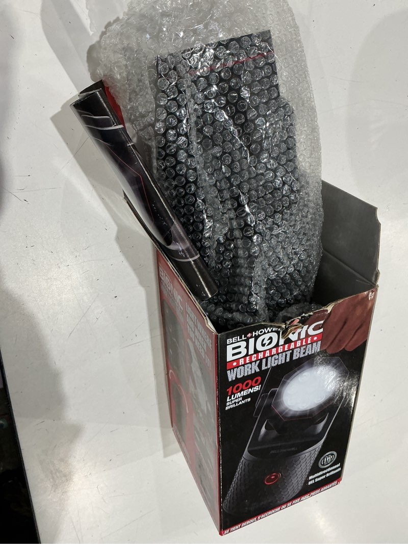 Condition photo showing As Is for bell + howell 1000-lumen led battery-operated and plug-in rechargeable portable work light