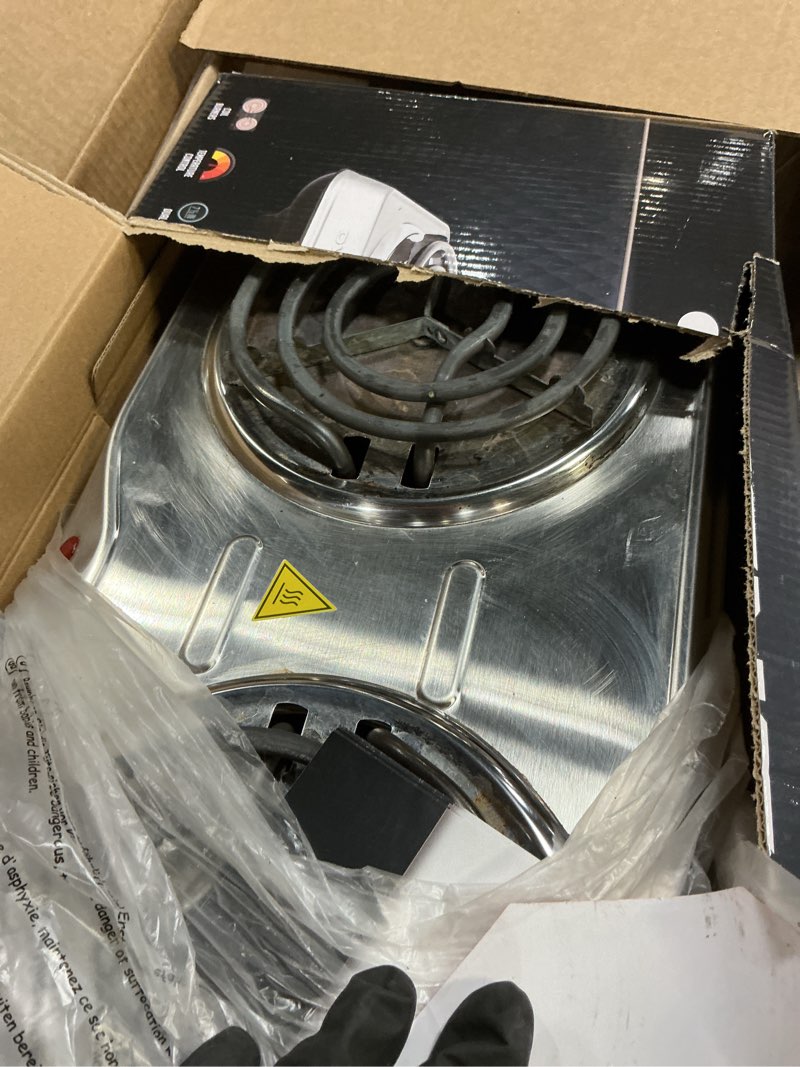 Condition photo showing As Is for OVENTE Electric Countertop Double Burner, 1700W Cooktop with 6" and 5.75" Stainless Steel Coil Hot Plates, 5 Level Temperature Control, Indicator Lights and Easy to Clean Cooking Stove, Silver BGC102S BGC102S - Silver