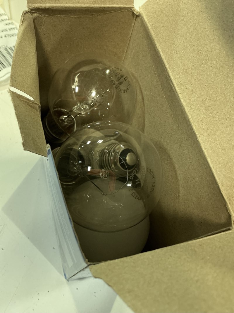 Condition photo showing As Is for ge refresh hd led light bulbs  100 watt  daylight  a19 bulbs  medium base  frosted finish  4pk