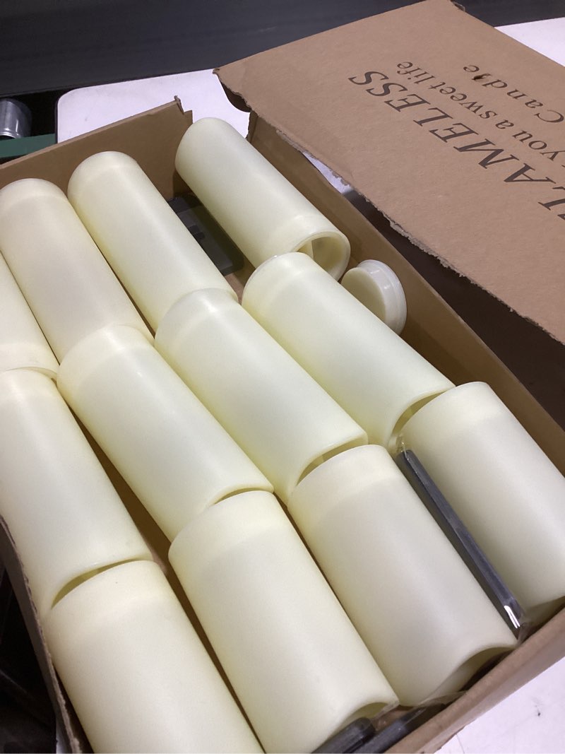Condition photo showing Good Condition for Set of 24 Waterproof Outdoor Flameless Candles, LED Candles with 4 Remote and Timer,(H 4" 5" 6" x D 2.2"),for Halloween Wedding Festiv 24Pack-Iovry