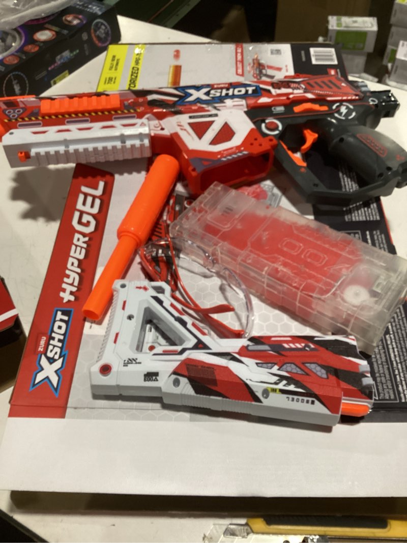 Condition photo showing As Is for xshot hyper gel hpg-700 motorized blaster (20,000 pellets) outdoor blaster by zuru for ages 14+