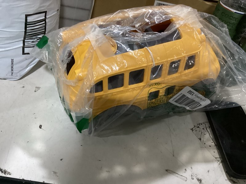 Condition photo showing As Is for green toys school bus yellow, standard