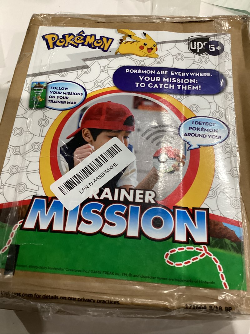 Condition photo showing As Is for Pokemon Trainer Mission - Electronic Detector Will Guide You On 40 Missions, Voice & Light Instructions, Collect 65 Pokemon, Trainer Map, Kids 5+ Brown Box Packaging