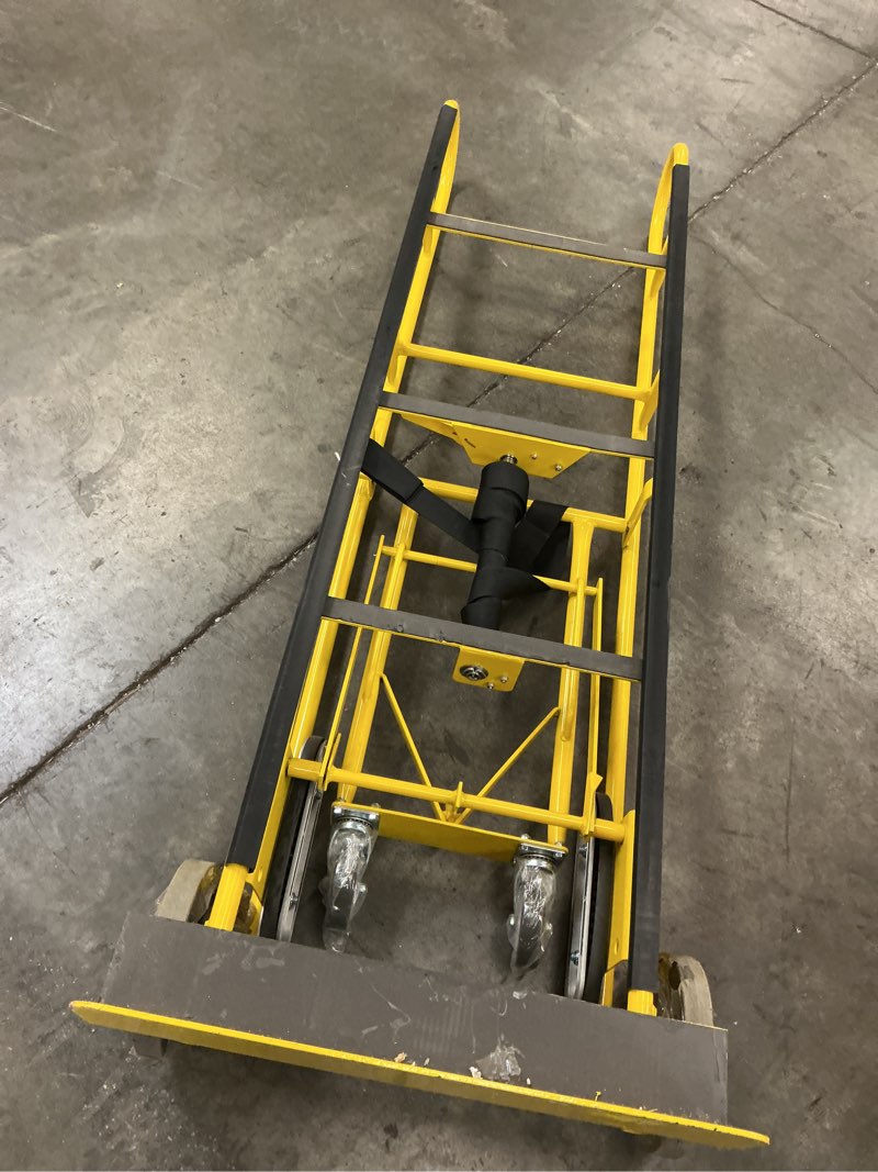 Condition photo showing As Is for strongway industrial hand truck – 1200 lb capacity heavy-duty appliance dolly, convertible 2/4-wheel design, 8" rubberized wheels, auto-rewind ratchet belt & stair-climbing capability