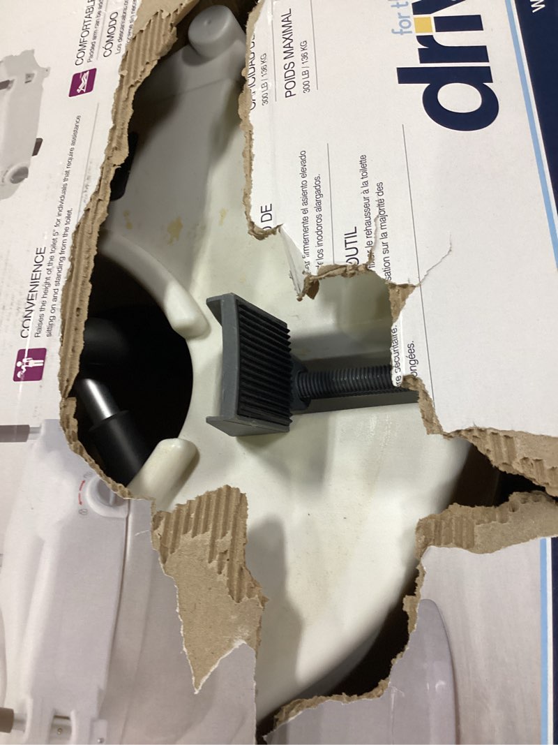 Condition photo showing As Is for bath safetyraised toilet seat product description: elev.toilet seat w/ remarms,rtl,1 ea