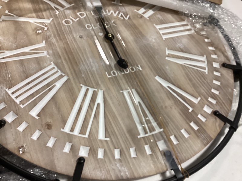 Condition photo showing Good Condition for 24 Inch Large Farmhouse Wall Clock, Rustic Antique Wood with Metal Circle and Large Engraved Numerals, Silent Battery Operated Wall Clock for Office Kitchen Bedroom Living Room Brown 24 Inch