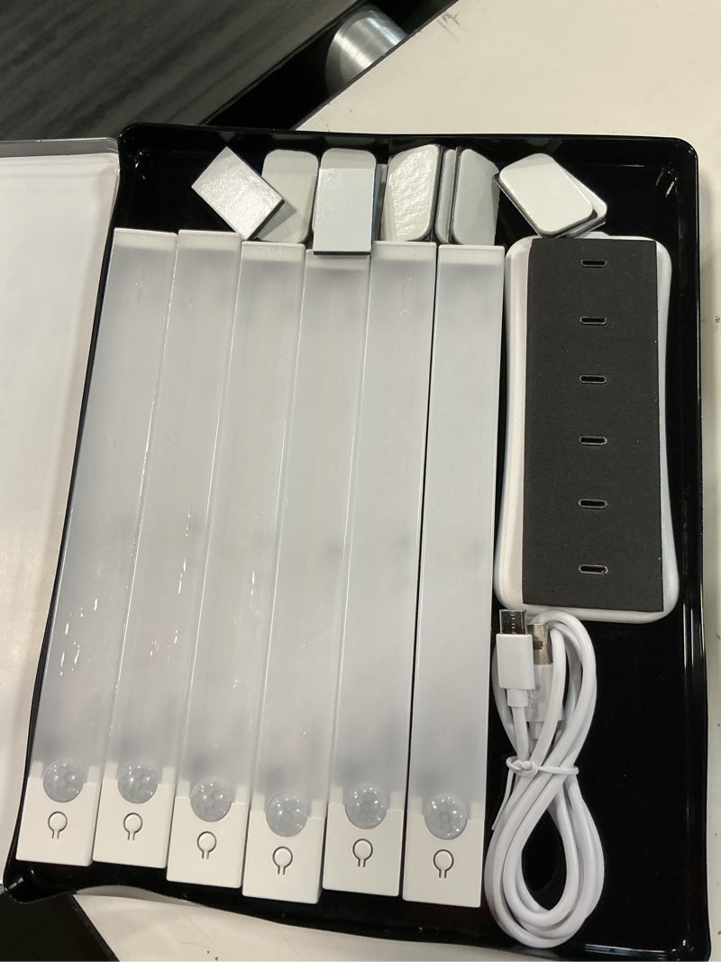Condition photo showing Good Condition for 6-pack 8-inch under cabinet lighting with charging station rechargeable motion sensor light indoor 3 color dimmable closet light usb led magnetic wireless under counter lights for kitchen stair 8inch 6pack with 1 station