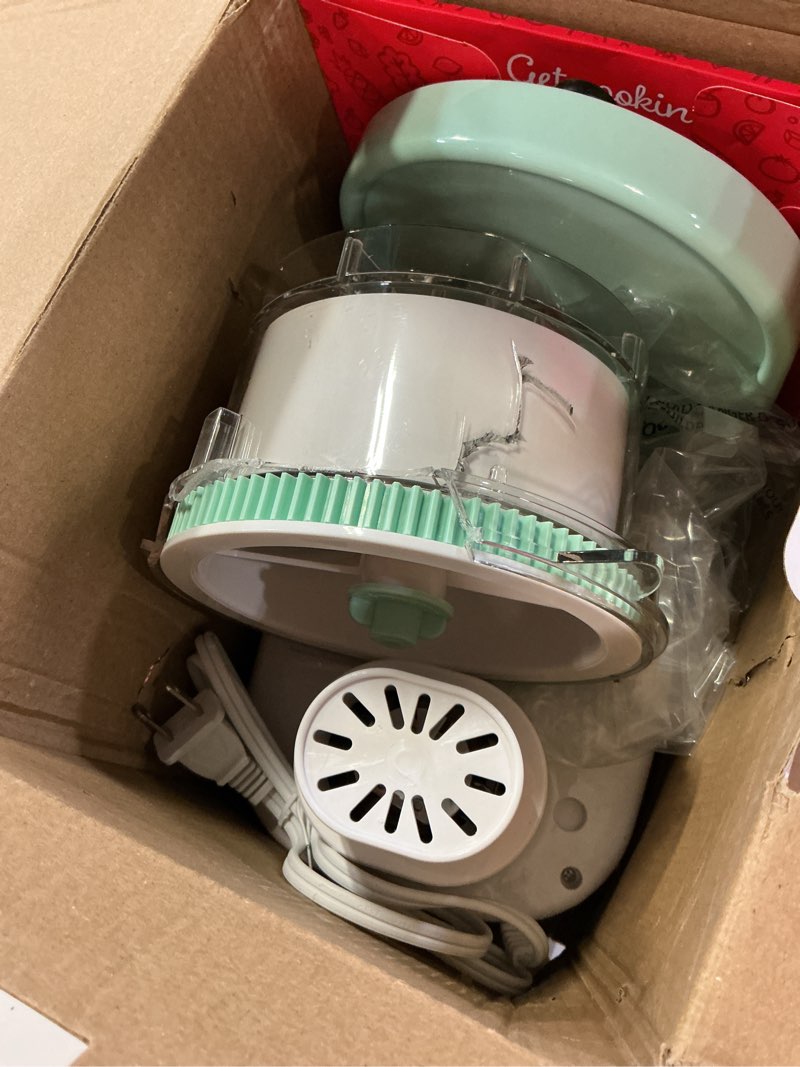 Condition photo showing As Is for dash shaved ice maker - frozen dessert maker for snow cones, slushies, cocktails & more - easy to use & clean - space-saving design - aqua aqua one size (pack of 1) shaved ice maker