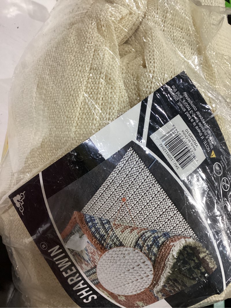 Condition photo showing As Is for 9x12 Non-Slip Area Rug Pad Gripper for Any Hard Surface Floors Keep Your Rugs Safe and in Place 9' x 12' (Rectangular)