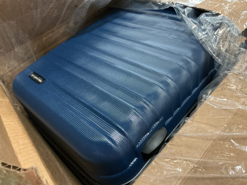 Condition photo showing As Is for Amazon Basics 21" Hardside Carry-On Luggage, Hardshell Suitcase With Wheels, Expandable For Up to 25% More Space, With Scratch-Resistant Surface, Four Multi-directional Wheels, Navy Blue Navy Blue Carry-On