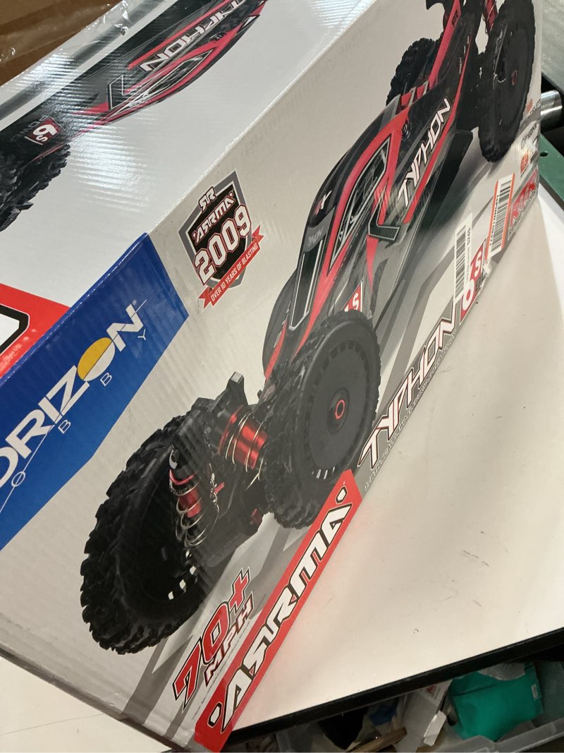 Condition photo showing As Is for ARRMA RC Car 1/8 Typhon 6S V5 4WD BLX Buggy with Spektrum Firma RTR (Ready-to-Run), Black and Red, ARA8606V5