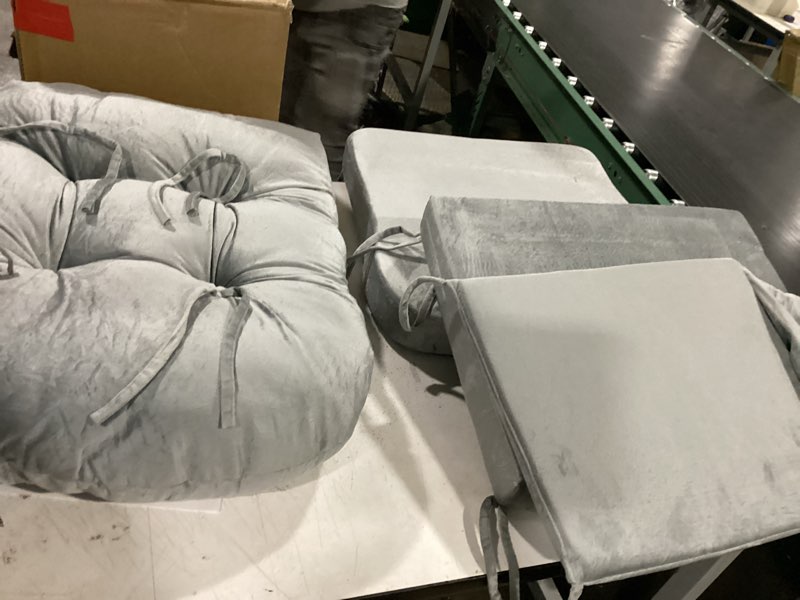 Condition photo showing New/Like New for 4  grey velvet cushions for chair misc.