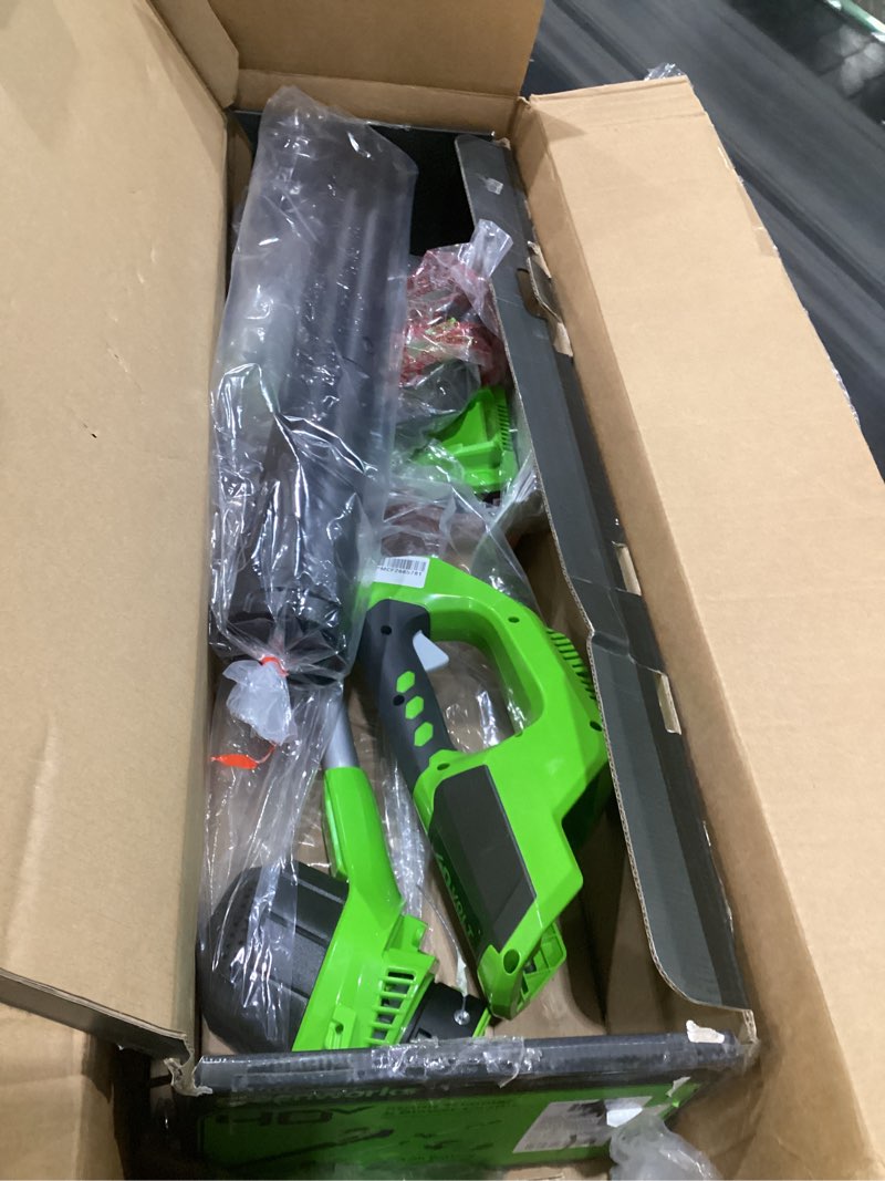 Condition photo showing As Is for (similar to stock photos, incomplete parts)greenworks 40v cordless yard tool combo kit with 2.0ah battery & charger – 13\" auto feed string trimmer and 350 cfm leaf blower, includes 3 bonus spools new combo (trimmer + blower + spools)