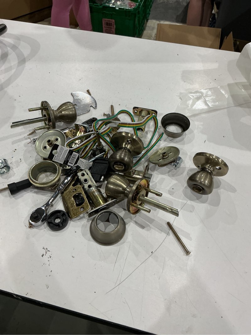 Condition photo showing As Is for assorted home improvement lot (small tools, screw, home accessories, etc.)