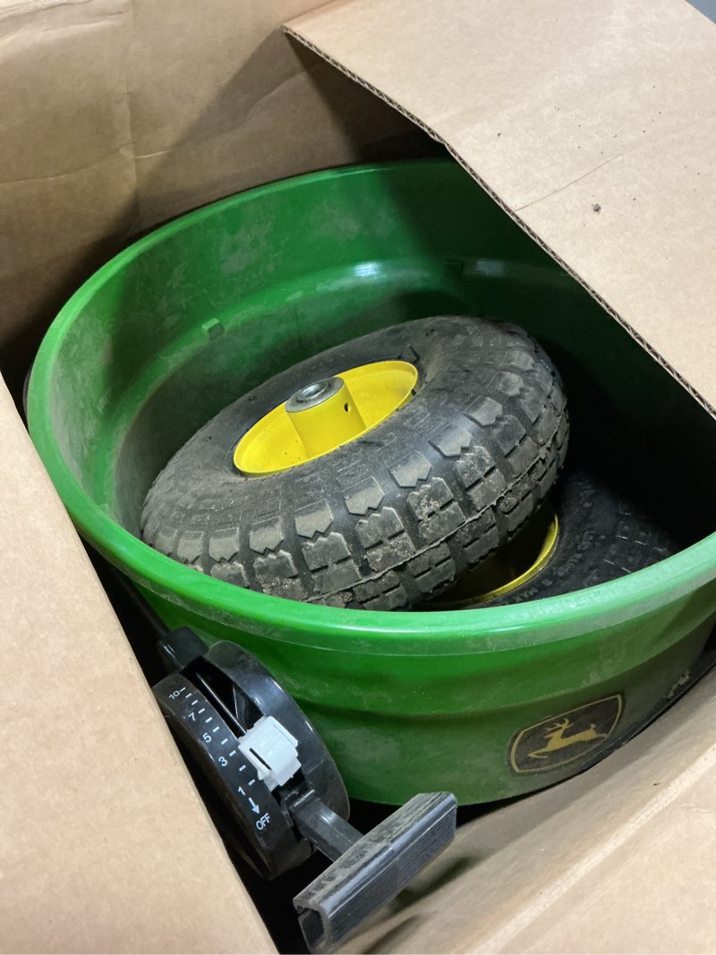Condition photo showing As Is for john deere 60 lb. push spreader 45-0566-jd