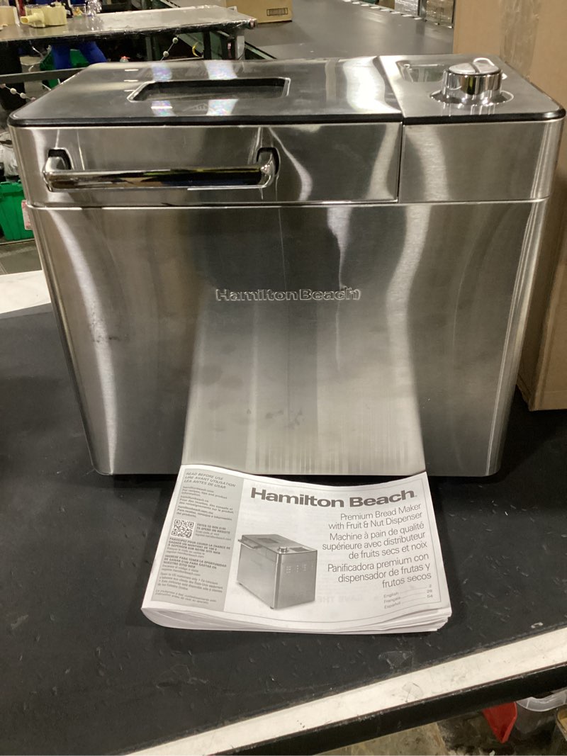 Condition photo showing As Is for hamilton beach 29890 premium dough & bread maker machine with auto fruit and nut dispenser, 2 lb. loaf capacity, 21 programmable settings includes gluten free+keto, stainless steel