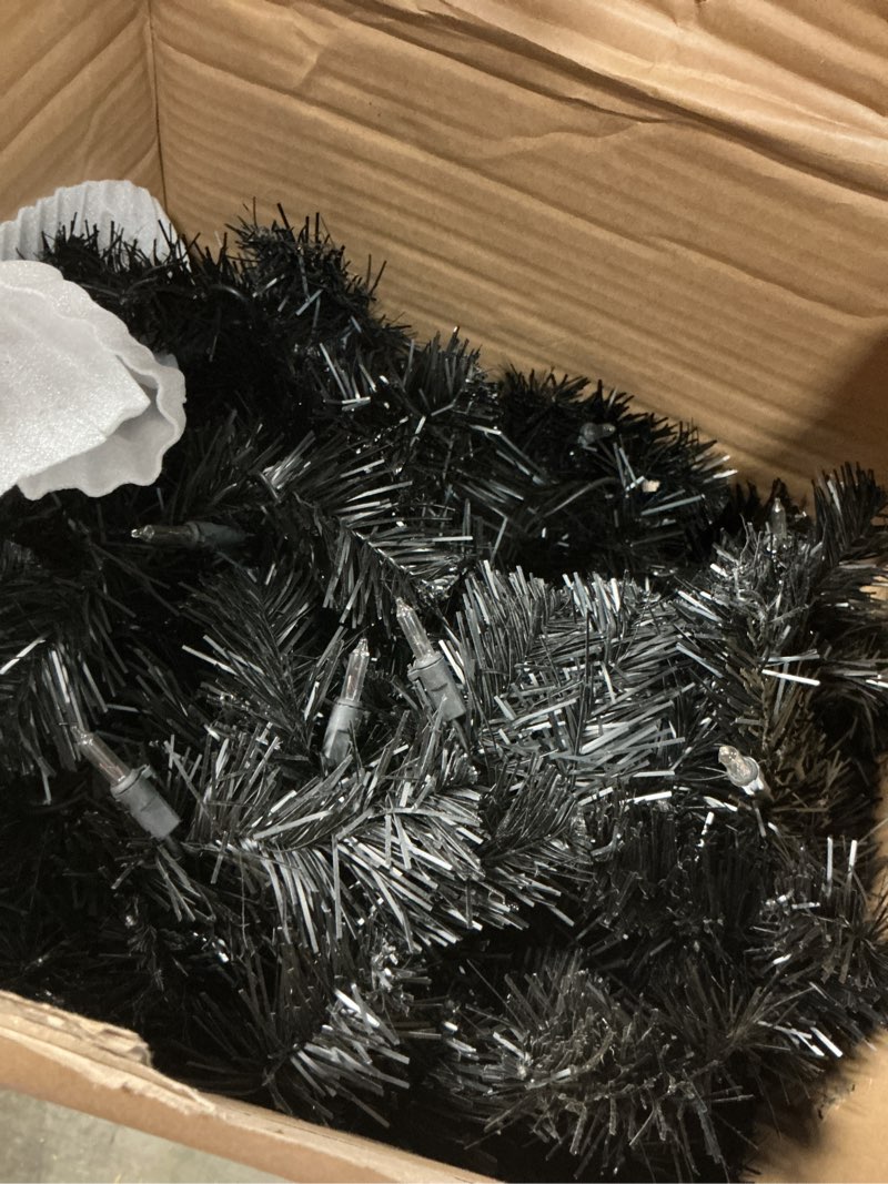 Condition photo showing As Is for National Tree Company Pre-Lit Artificial Full Christmas Tree  Black  North Valley Spruce  White Lights  7.5 Feet