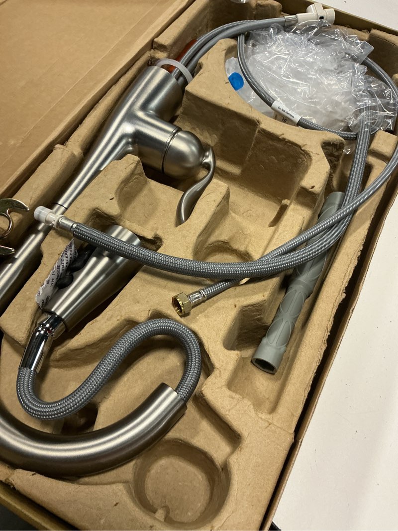 Condition photo showing As Is for moen arbor spot resist stainless one-handle pulldown kitchen faucet with sprayer and a reflex docking system, kitchen sink faucet featuring power boost for a faster clean, 7594srs stainless standard