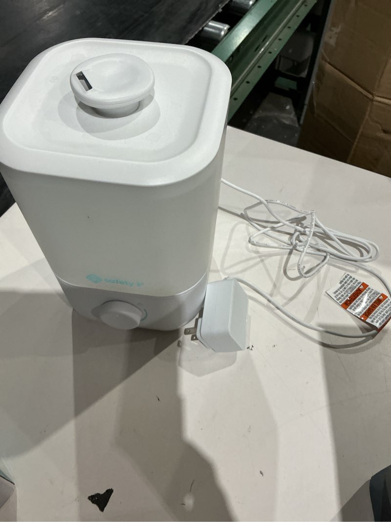 Condition photo showing As Is for easy-fill cool mist humidifier top fill, no spills