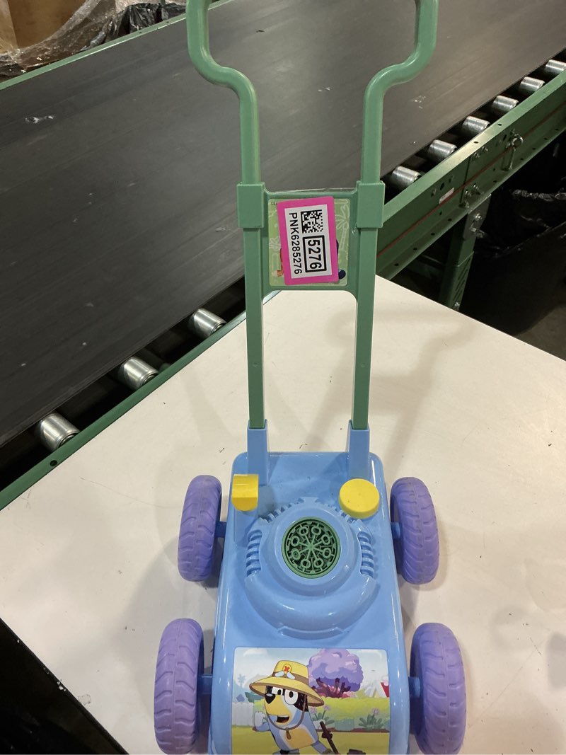 Condition photo showing As Is for bluey bubble lawn mower for toddlers, bubble blowing machine with sound for indoor and outdoor gardening toy, plays bluey music, birthday, party favor for preschool girls and boys
