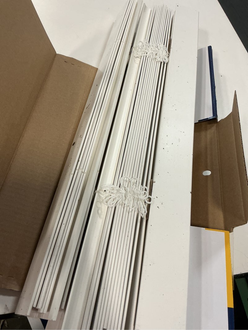 Condition photo showing As Is for levolor trim+go 2-in slat width 23-in x 48-in cordless white faux wood room darkening horizontal blinds