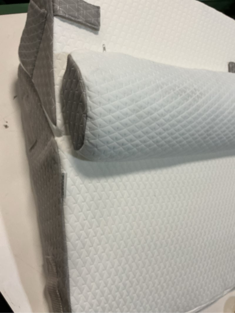 Condition photo showing As Is for bed wedge pillow