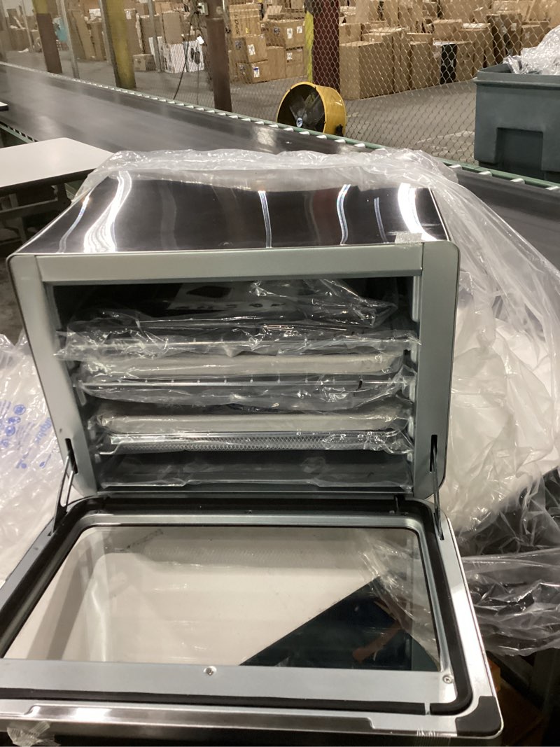 Condition photo showing As Is for Ninja Air Fryer & Toaster Oven | Foodi Series, XL Pro Air Oven Kitchen Countertop Convection | 10-in-1 Functions | Fits a 5-lb Chicken & Sheet Pan of Vegetables | 1800 Watts | Stainless Steel | DT201
