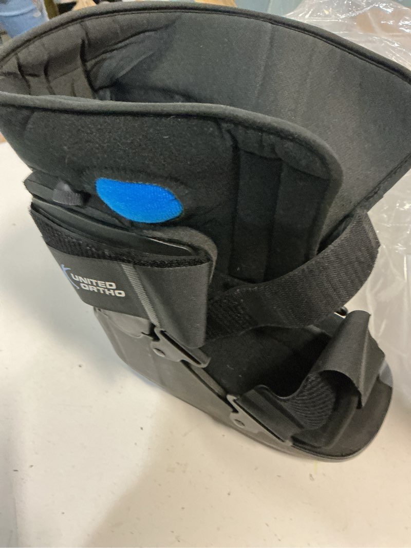 Condition photo showing As Is for united ortho short air cam walker fracture boot, small, black black small boot