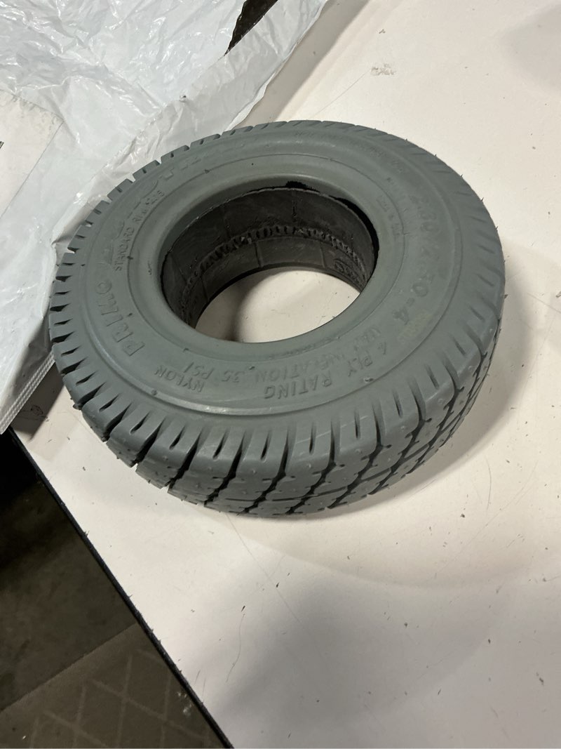 Condition photo showing Good Condition for 2.80/2.50-4 solid foam filled tire - ribbed tread - primo spirit