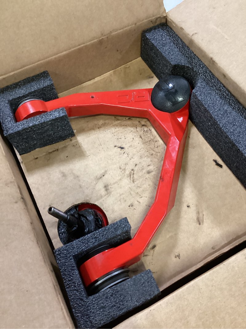 Condition photo showing As Is for rough country forged upper control arms for 2007-2018 chevy/gmc 1500-19401ared