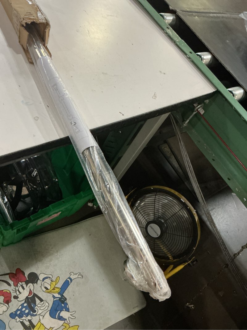 Condition photo showing As Is for exclusive home tension rod, adjustable 36\"-63\" silver 36\"-63\"