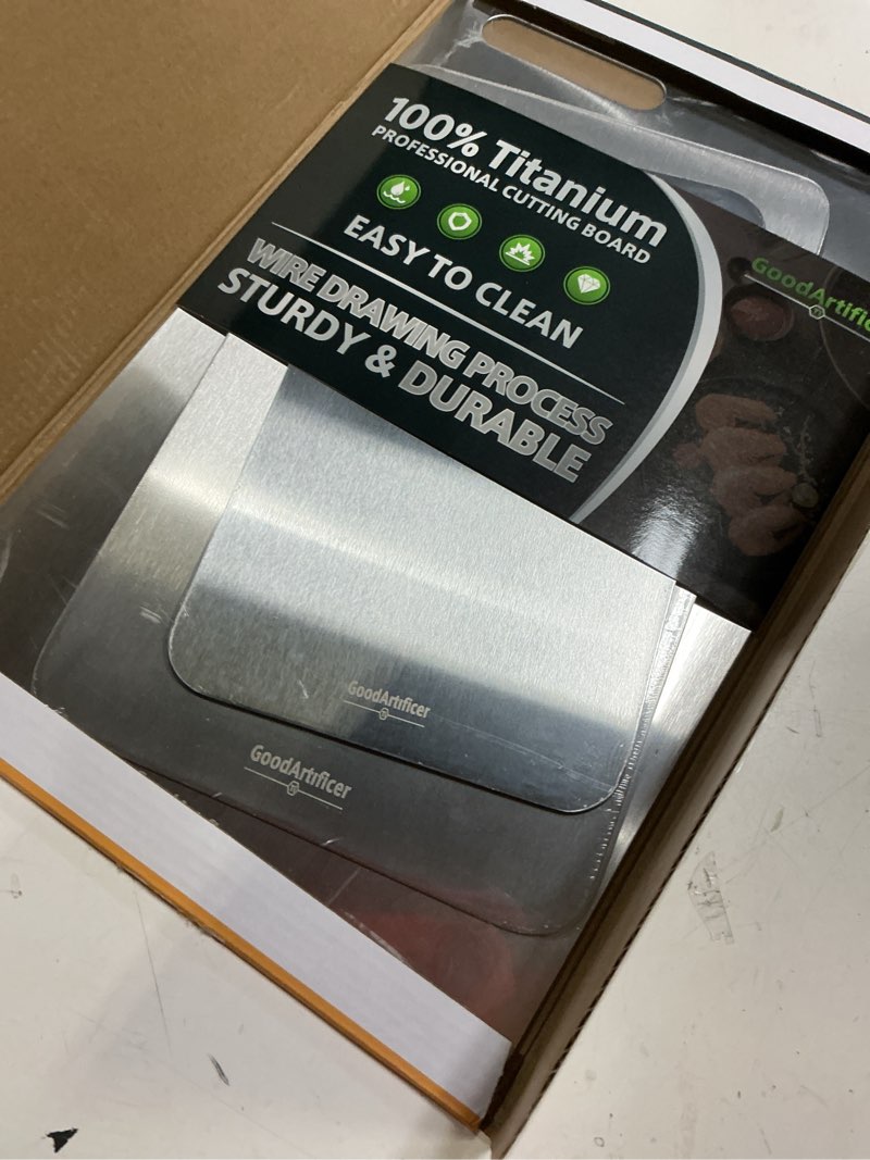 Condition photo showing Good Condition for titanium cutting boards set of 3, 100% pure titanium kitchen cutting board, double-sided non-toxic cutting board, ideal for slicing and dicing meats, features handle, dishwasher safe silver 16"l*10"w(s+m+l)