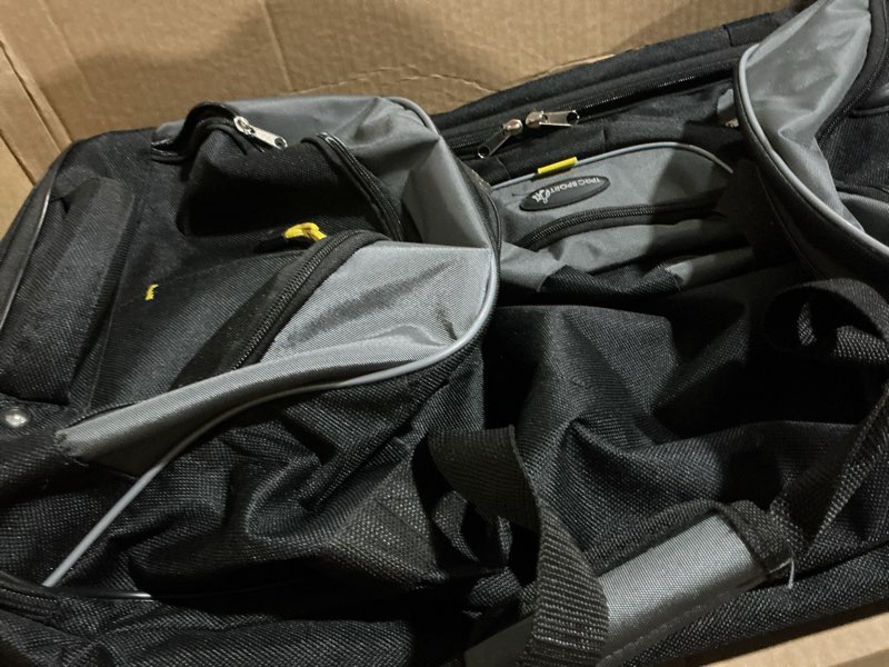 Condition photo showing As Is for tprc sierra madre duffel bag, black, 21" rolling 21-inch