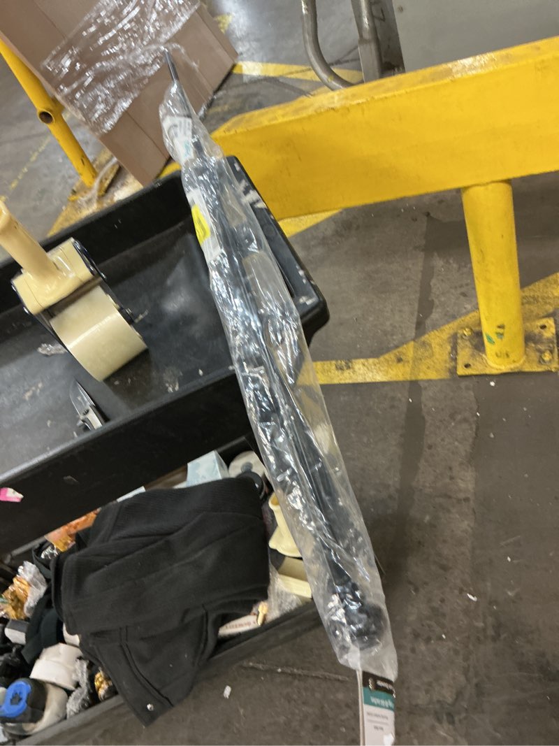 Condition photo showing As Is for mainstays 1/2 inch black cage  48” to 84  width  single curtain rod set