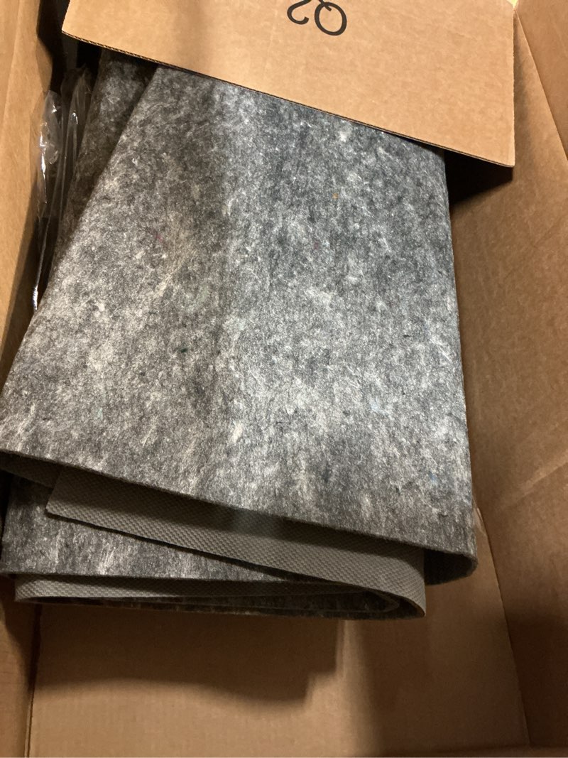 Condition photo showing As Is for Mohawk Home 8' x 10' Non Slip Rug Pad Gripper 1/4 Thick Dual Surface Felt + Rubber Gripper - Safe for All Floors, Brown