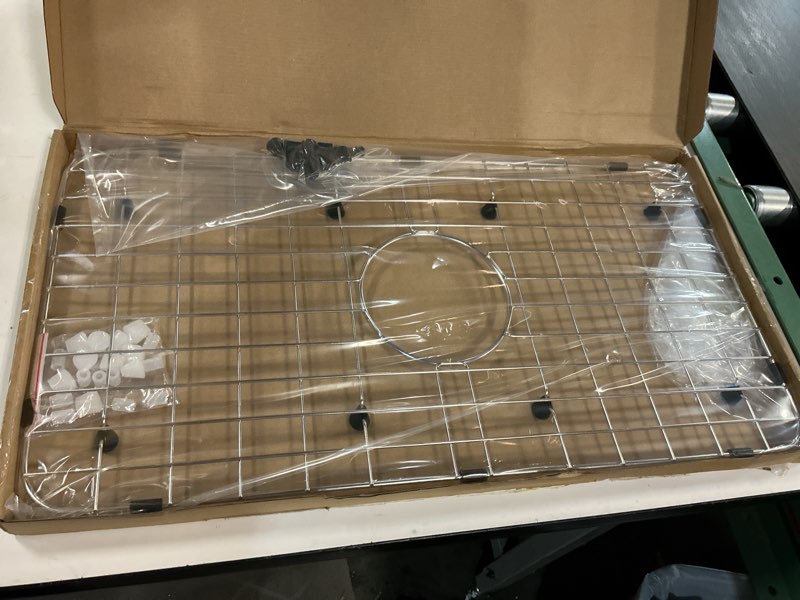 Condition photo showing New/Like New for Serene Valley Sink Bottom Grid 24-1/8" x 12-5/8", Centered Drain with Corner Radius 1-1/2", Sink Protector NLW2412C